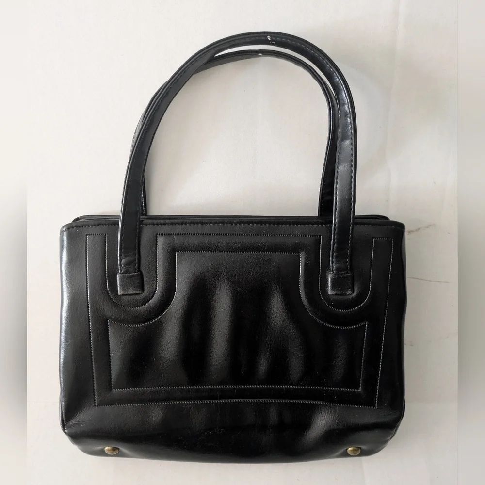 Vintage JR Florida handbag purse multiple inner pockets. Black, good condition.